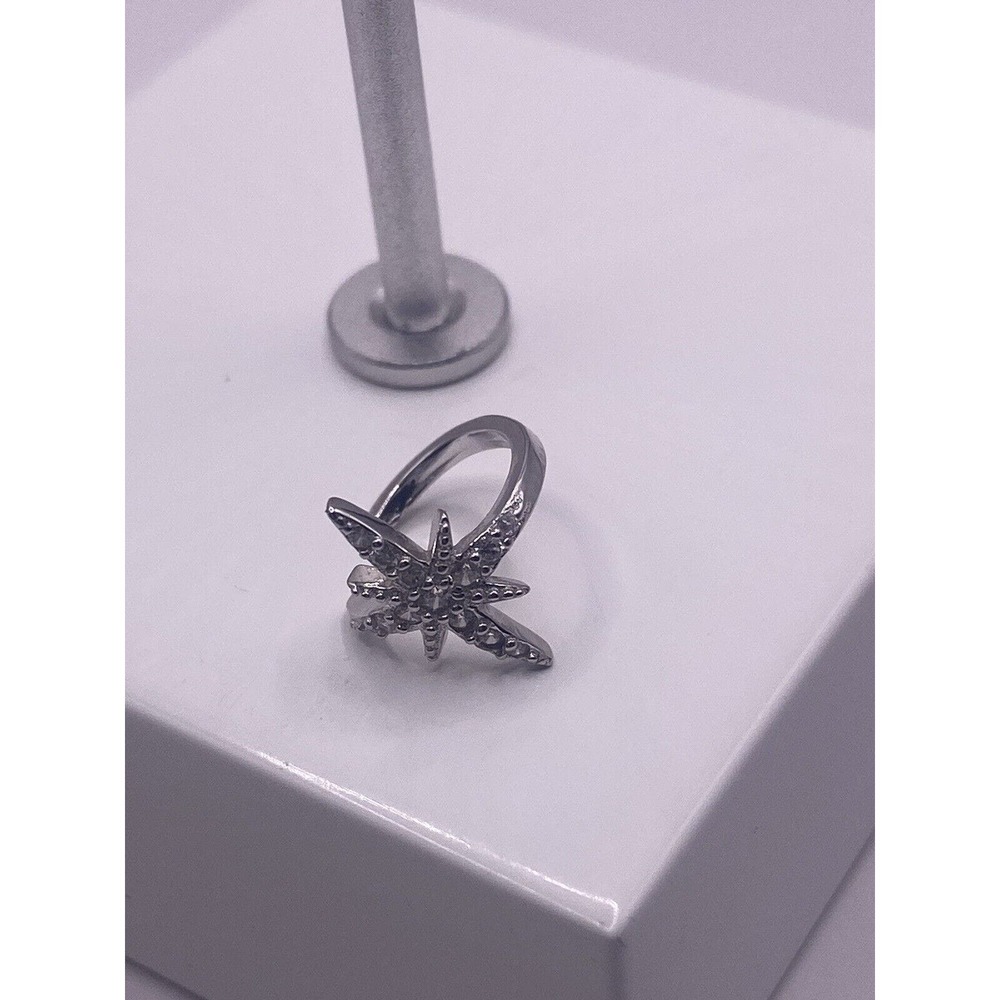 Bursting star clip earring sterling silver